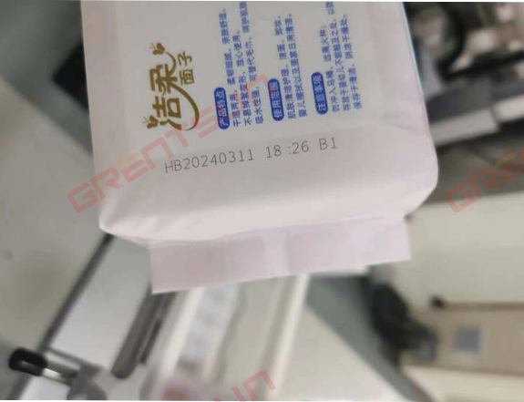 紫外激光喷码机在洗脸巾生产日期喷码中的应用